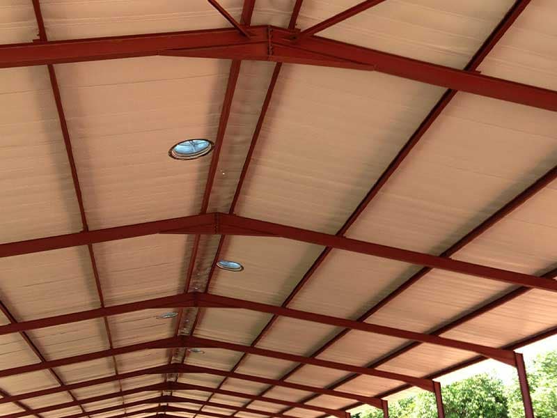 Steel structure fitted with bubble foil roofing insulation and roof ventilators