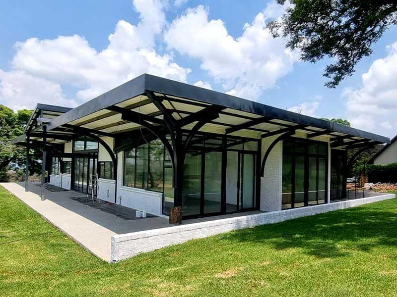Steel-frame house exterior with cladding installed