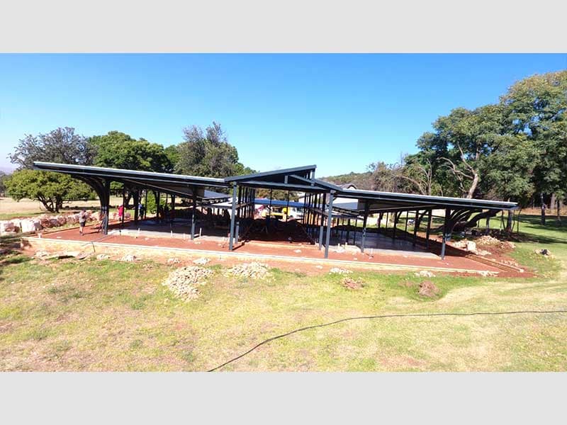 Customised steel-frame house approach and entrance