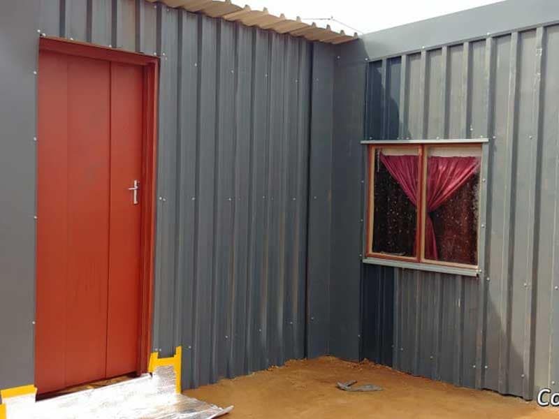 Small steel-frame house built in Tembisa as a social responsibility project